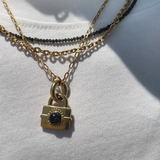 Black square lock charm - guldbelagt