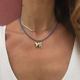 Fishbone charm - guldbelagt
