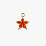 Red stardust charm - guldbelagt