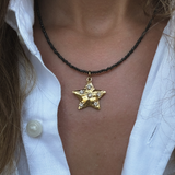 White sparkling star charm - guldbelagt