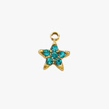 Turquoise stardust charm - guldbelagt